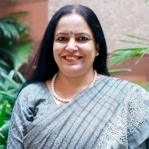 Ms. Pratibha Singh as Senior Mistress at Dharav High School